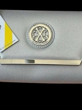 C. Wonder Silver Textured Clutch